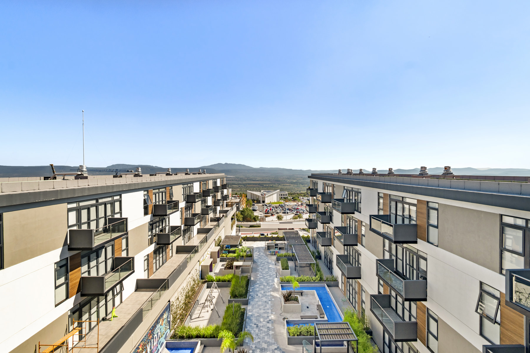 xentric, anahuac, queretaro, proyecto, wolstrat, plaza, comercial, suites